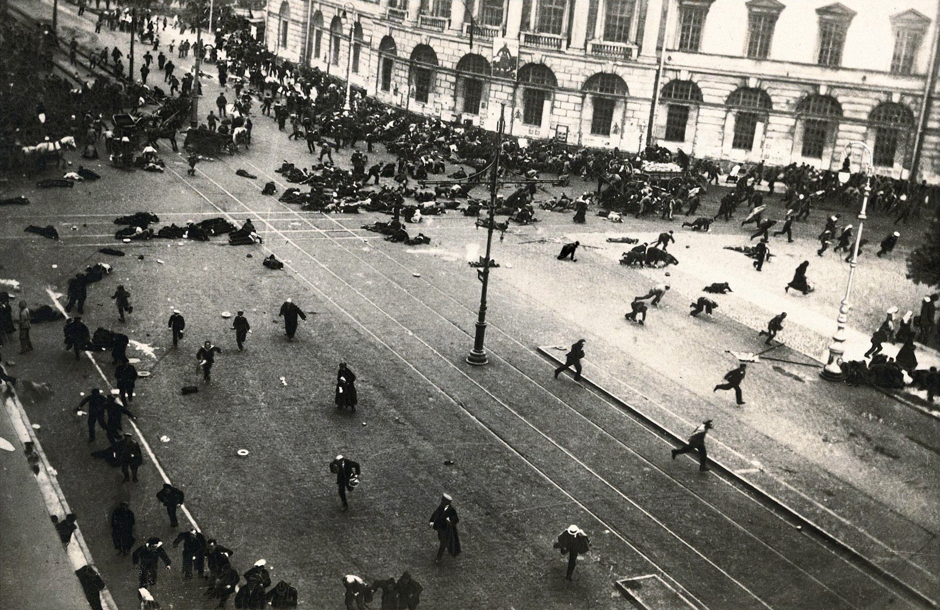 Street protesters scattering under army gunfire during the July Days of 1917